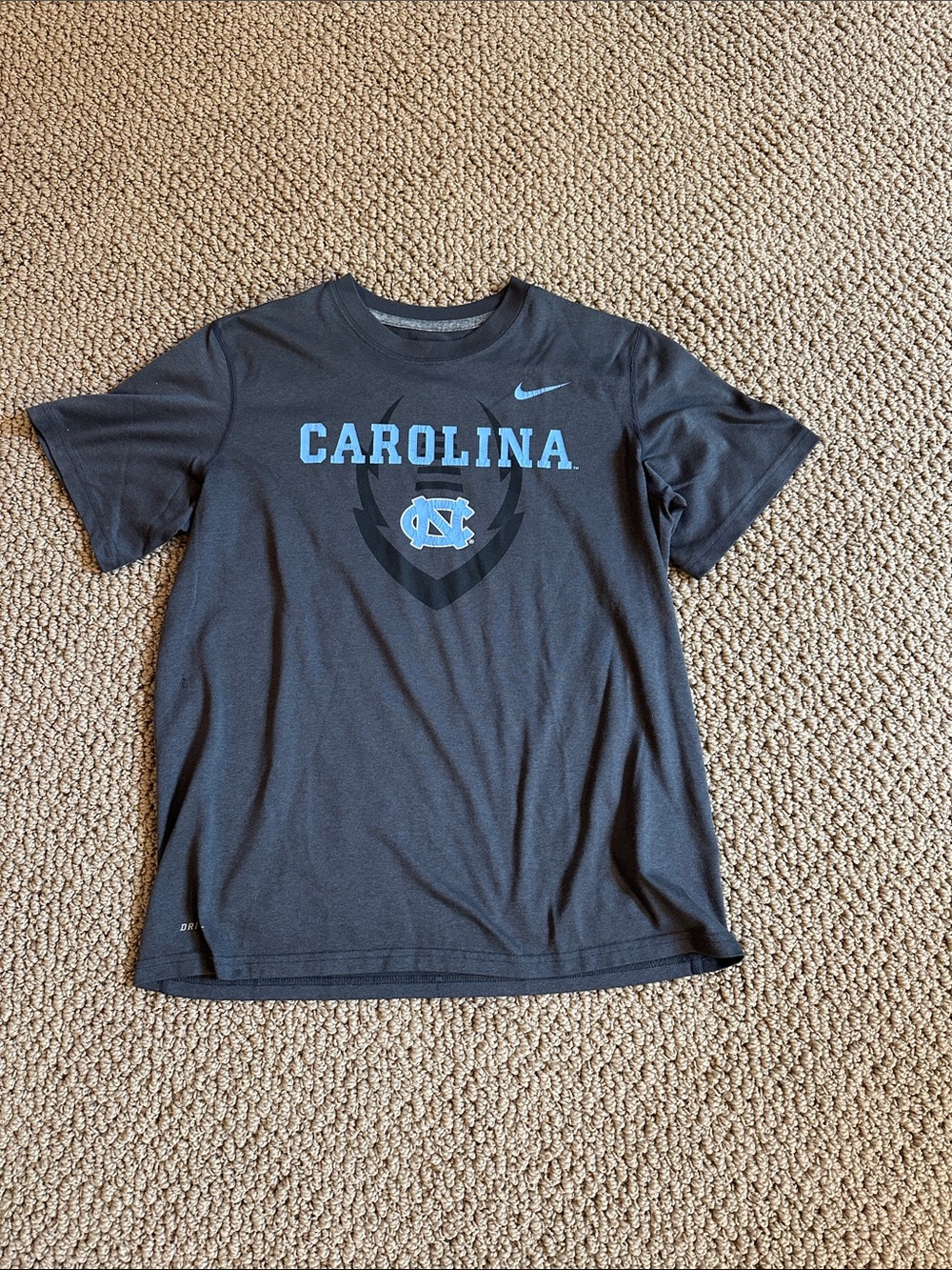 Nike Kids Black Graphic Tee with Carolina Blue Logo